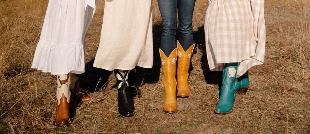 Four women model boots